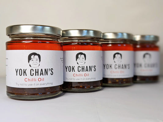 Four jars of Yok Chan's Chilli Oil left focus